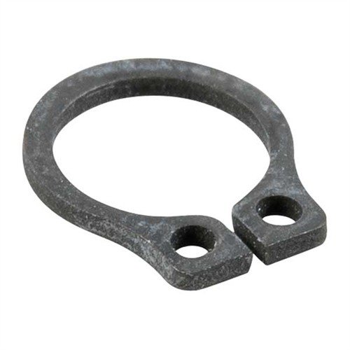 Il REMINGTON 1100/11-87 INTERCEPTOR LATCH RETAINER offre una sostituzione più spessa per ridurre il gioco nel corpo del gancio, garantendo un'alimentazione sicura.