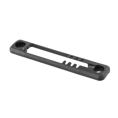 Die M-LOK Tape Switch Mounting Plate von MAGPUL bietet eine sichere und leichte Montage für Surefire ST Druckpads, mit einem schlanken Design und snagfreier Oberfläche.